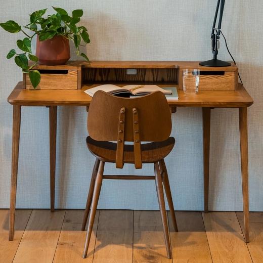 Let working from home be the most stylish place to be with our new Ercol Treviso desk. Its clean, ang...